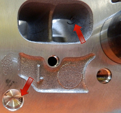 Metal slivers/chips in the inlet channel and in cavities of the cylinder head