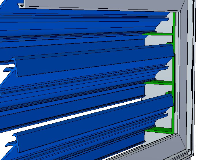 Green part at the frame end of the blades is the blade holder clip